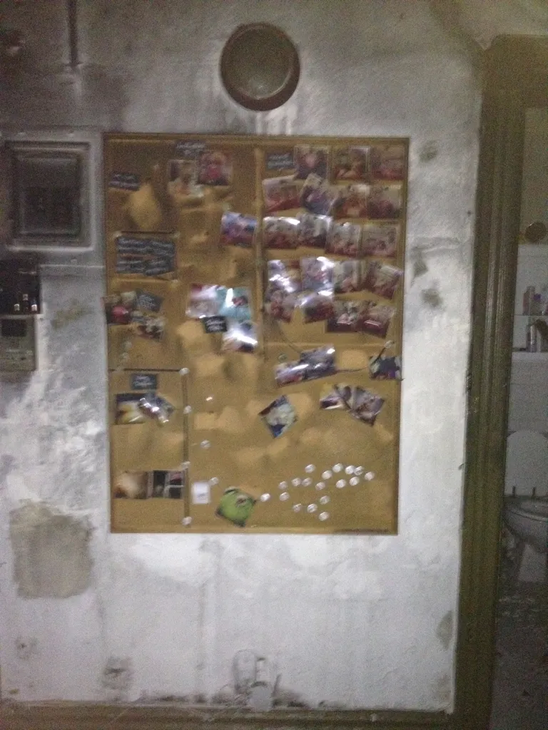 A corkboard with melted pushpins