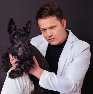 Douglas Widick and Skye, the Scottie who inspired his latest show, From Wolf to Baby: The Creation of The Dog.